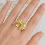 Bow Spring Ring