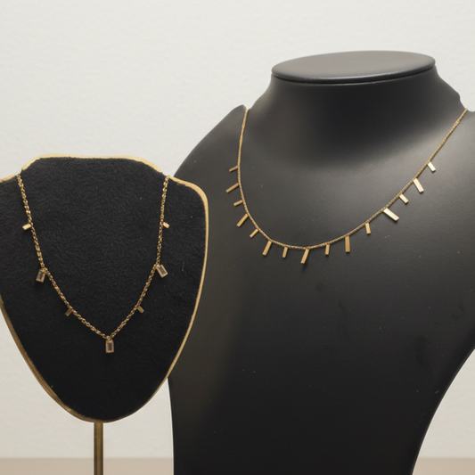 Black and gold decorative item on a marble surface